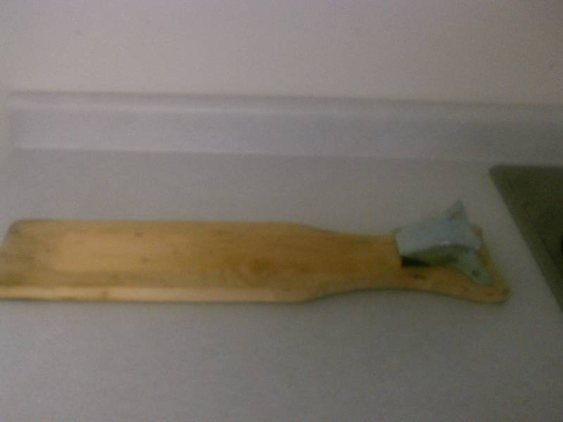 lot 18 image: Fish Cleaning Board, wood with metal clamp