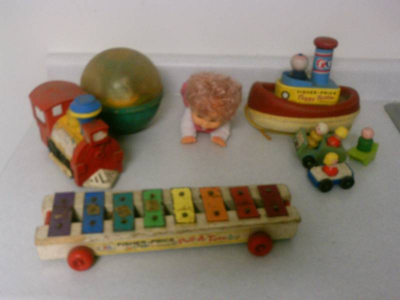 lot 88 image: Fisher Price Vintage Toys, Tuggy Tooter, Pull a tune, toot-toot train