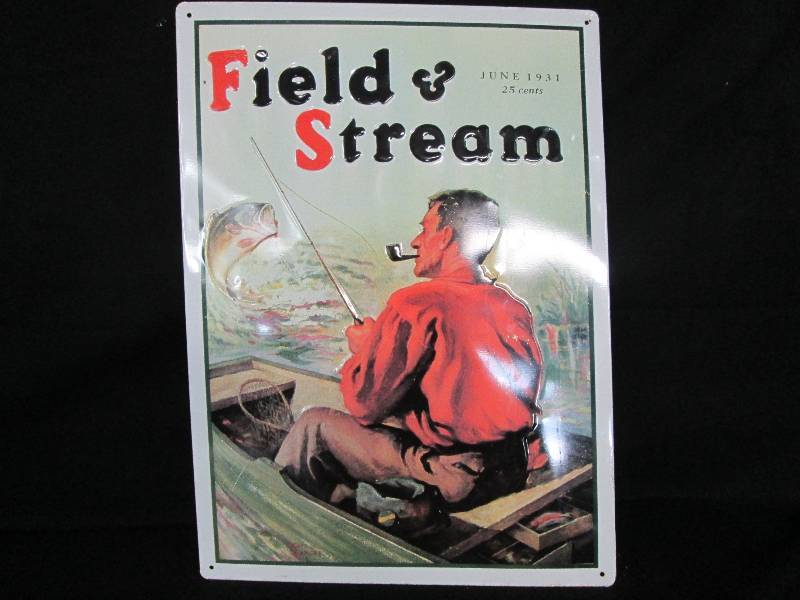 lot 33 image: Collectible Tin sign