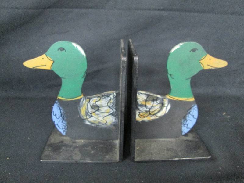 lot 42 image: Painted Iron Bookends
