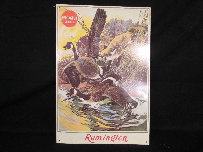 lot 55 image: Embossed Tin Remington Sign