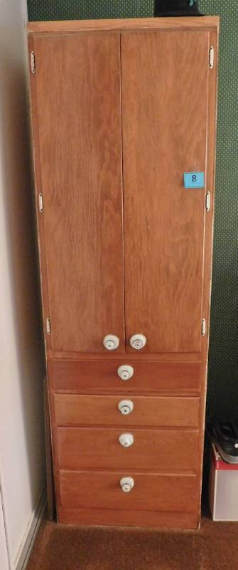 pantry with cabinet and 4 drawers