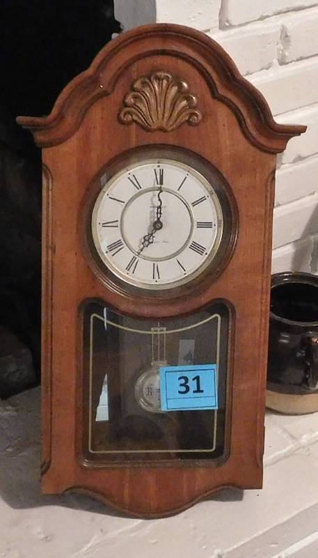 very nice battery operated Howard Miller clock