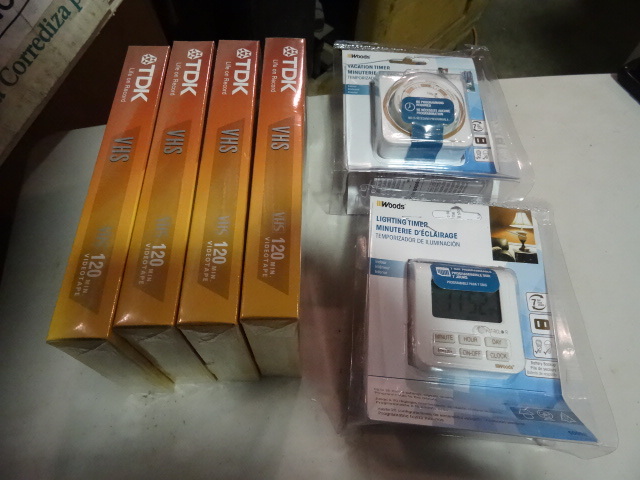 NEW Qty 2 Lighting Timers and Qty 4 VHS Tapes (Antique At least Quaint)
