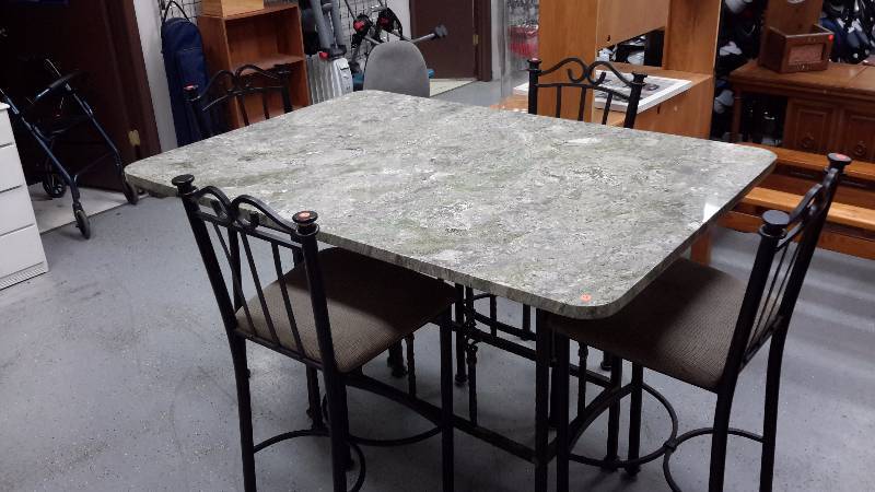 Green marble table with 4 bar style chairs