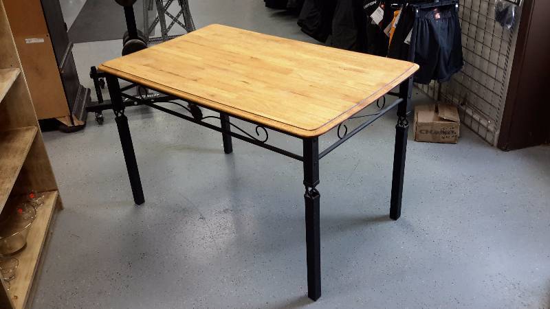 Wooden top table with metal legs