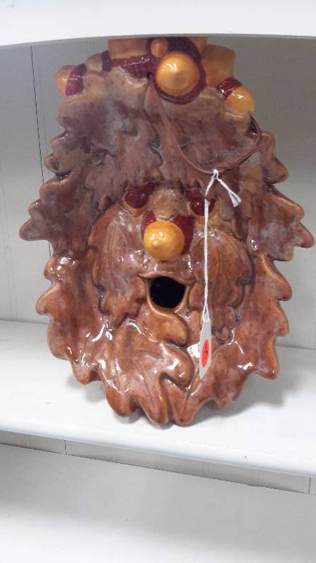 Ceramic tree face birdhouse
