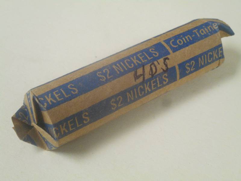 1 roll of mixed date nickels from t...