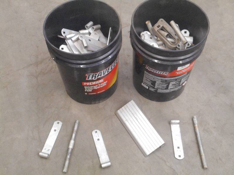 lot 66 image: (2) Buckets Of Aluminum Hinge Piece...