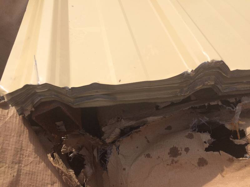 LOT 4 APPROX 40 SHEETS BEIGE 16 FT STEEL SIDING 29 GA