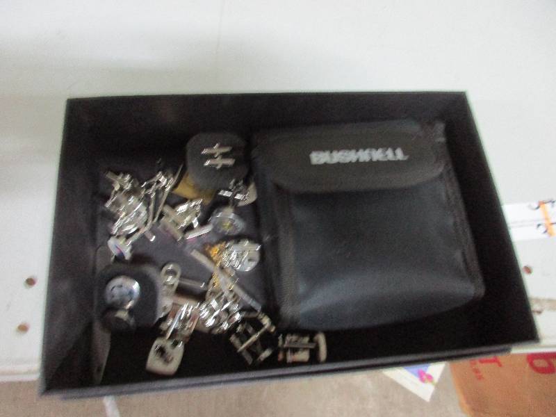 lot 37 image: Cuff links and binoculars