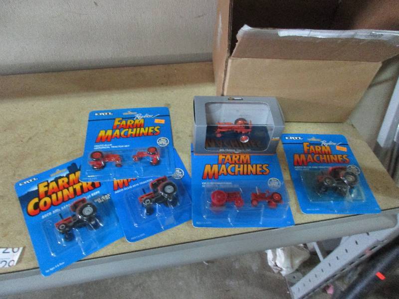 lot 129 image: ERTL Allis Chalmers and CASE Farm Machine Replica Collectibles in Original Packaging6670, 6680, WD-45, C, 6690, and CASE Historical Set.  Allis Chalm ers