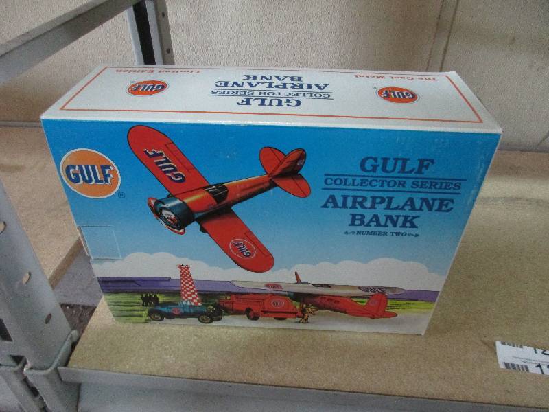 lot 131 image: Gulf Oil Collectable Coin Bank Travel Air Model R