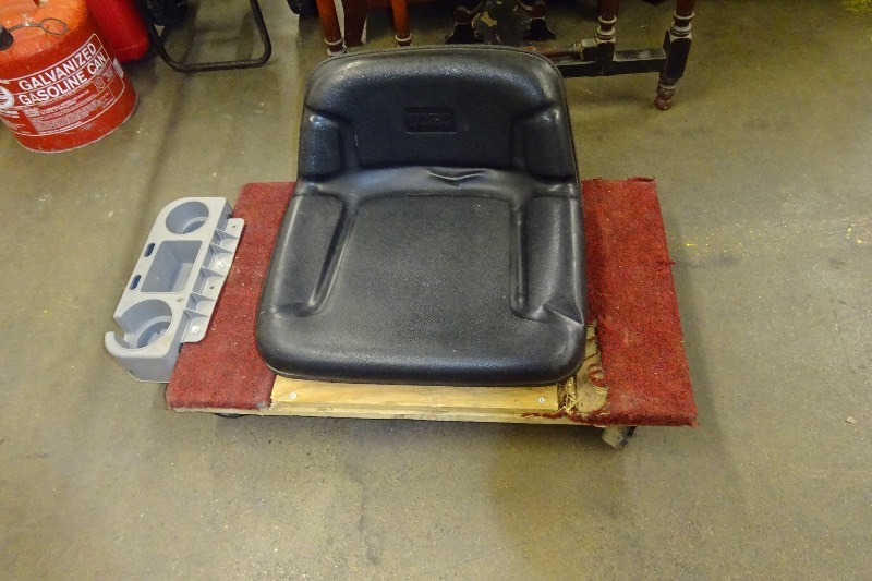 Rolling cart with seat