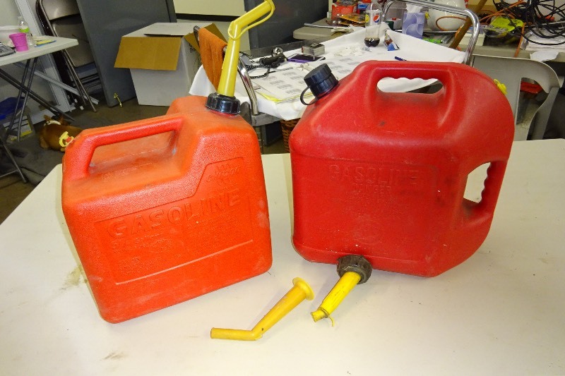 2 plastic gas cans