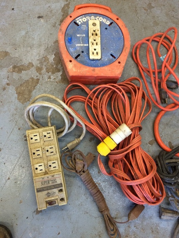 Box lot of extension cords, heat gun