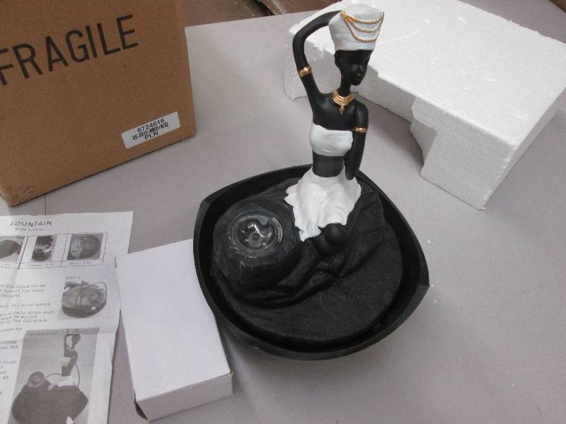 lot 73 image: African Woman Fountain, open box, u...