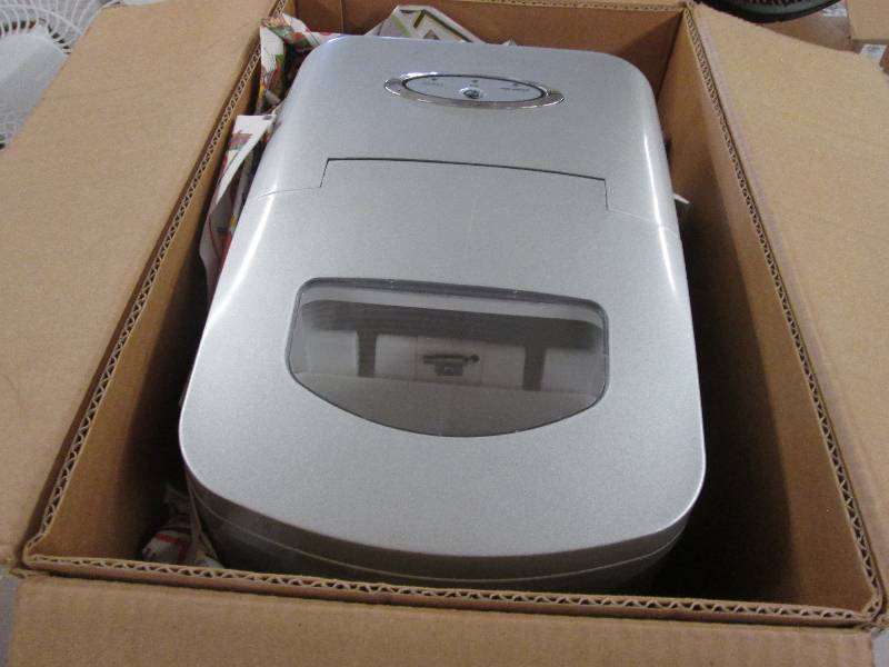 lot 132 image: Ginnys Brand Ice Maker out of  box...
