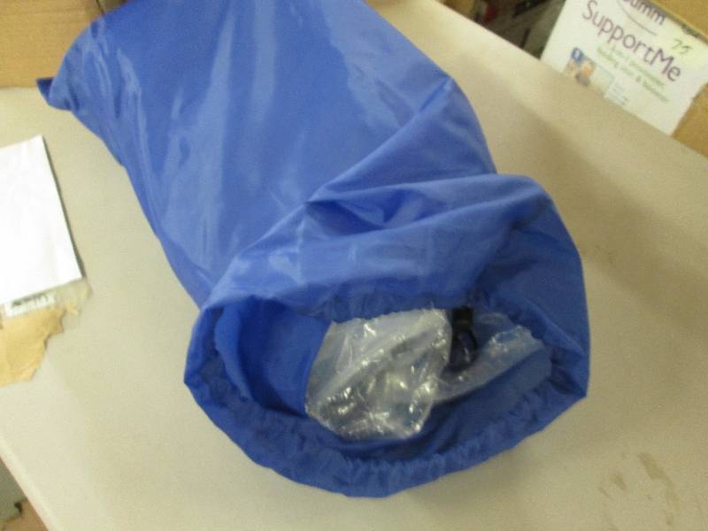 lot 151 image: Tuck-Me-In Travel Bed open box, unt...