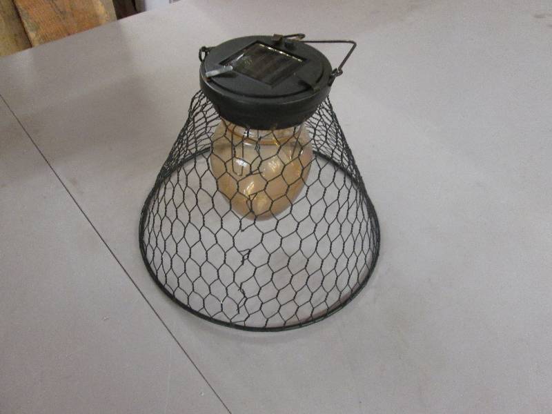 lot 213 image: Solar Lantern (right on picture) op...