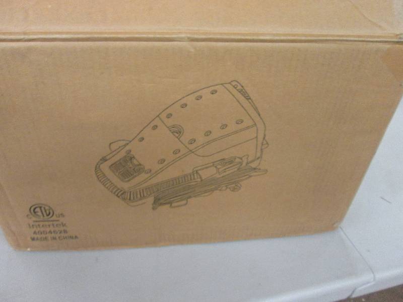 lot 215 image: Backpack Vac open box, untested Ret...