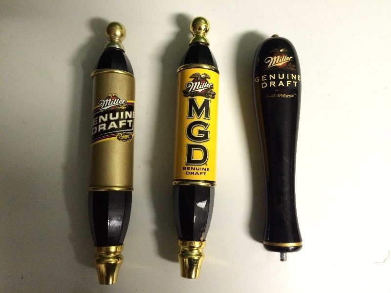 lot 6 image: THREE MILLER BEER TAPS