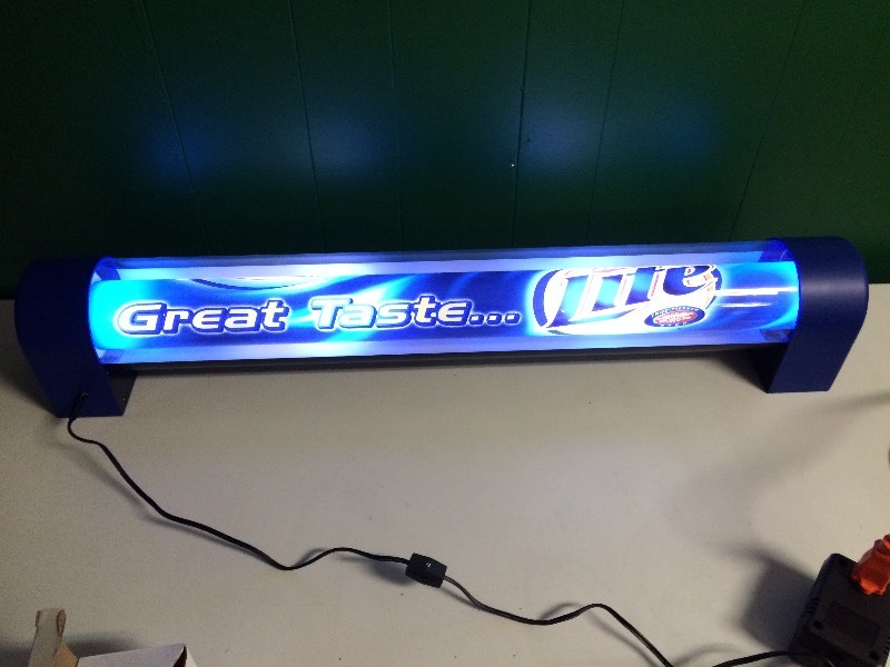lot 9 image: MILLER LITE BEER LARGE SPINNING LIGHTED SIGN