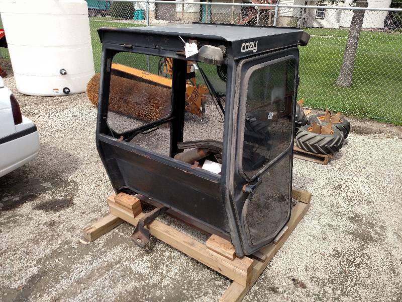 lot 11 image: Cozy Enclosed Cab, Fits Lot 10...