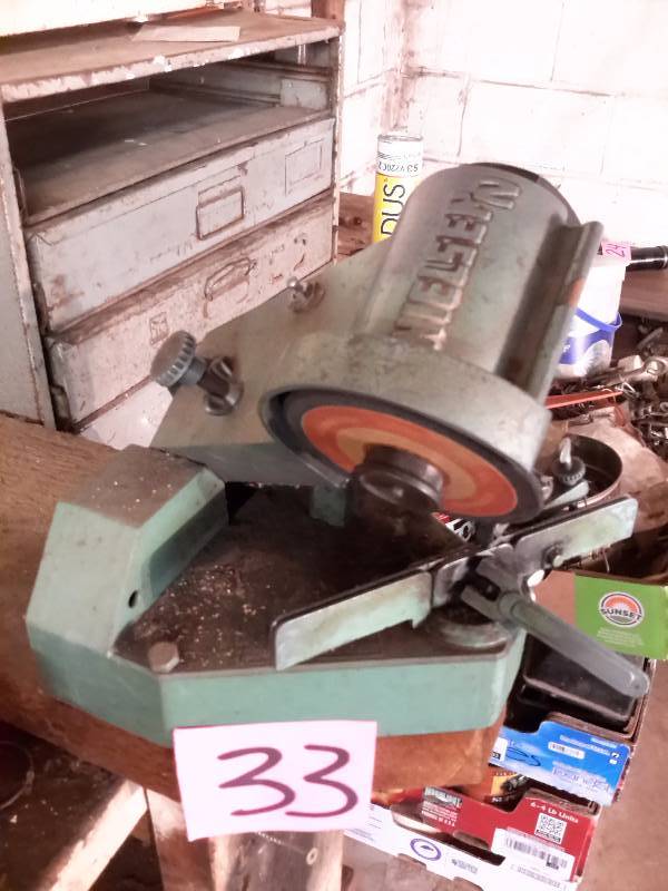 lot 33 image: NIELSEN, Chain Saw Sharpening tool.. Tested and Works