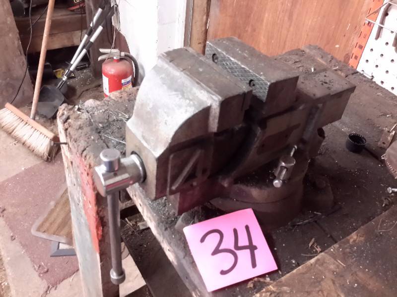 lot 34 image: No. 4, Vise.. Cant find any other markings.. Its old, so probably Made in USA, but not sure.  You must remove this yourself.