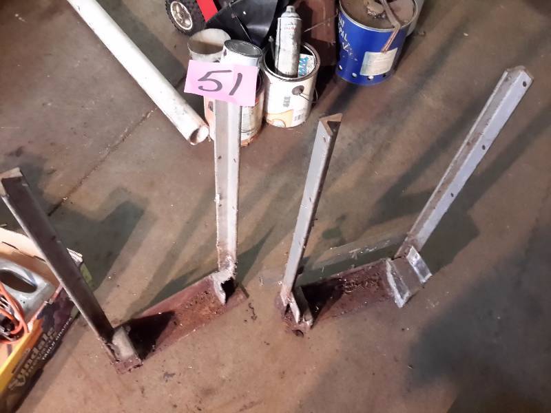 lot 51 image: 2, end pieces for a wood holding unit.. Only the Hardware.. No wood