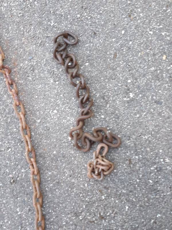 lot 71 image: 2, Long logging chains. (150in long)  1, shorter log chain.