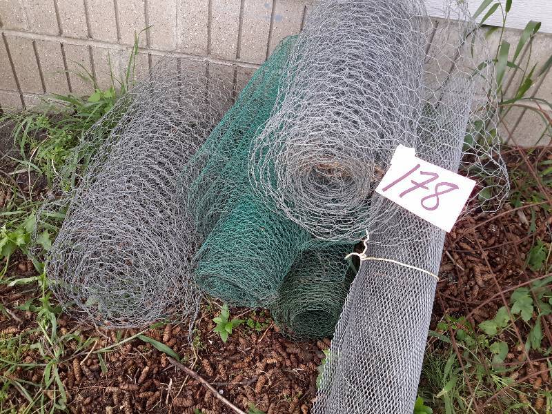 lot 178 image: Rolls of 2 ft chicken wire  7, plant holders, Plastic snow fence