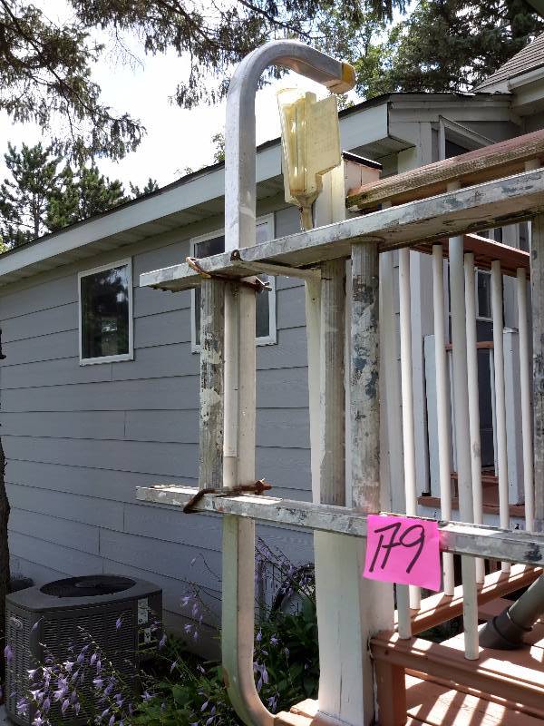 lot 179 image: 20 ft Extension ladder with wide wall support as shown.