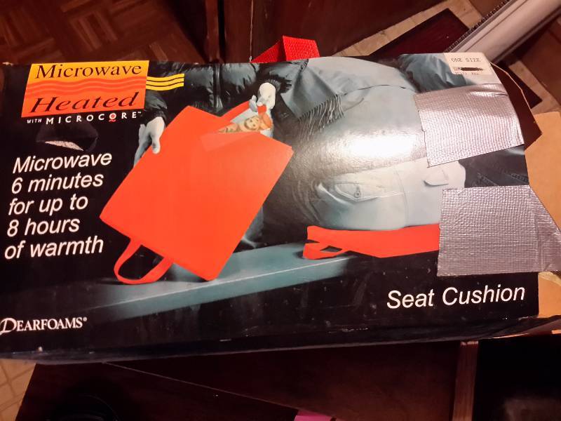 lot 185 image: Misc. shoe attachments for walking on icesnow.  Microwave heated seat.. Heat for 6 minutes, holds up to 8 hours.. Hmmmmmm 2 Sets of knee pads (only one shown).