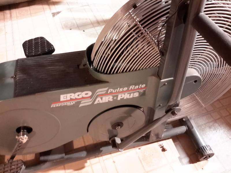 lot 190 image: ERGO, Exercise Bike with fan.. Works.. Needs some tightening.