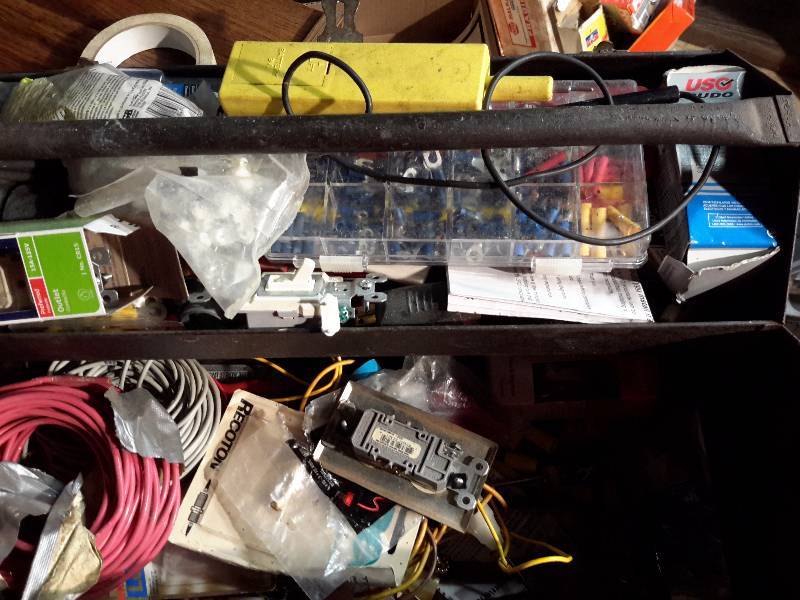 lot 202 image: Metal Tool box full of Electrical items.. See closeups