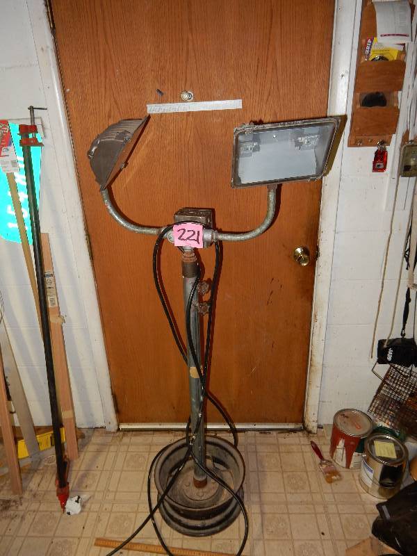 lot 221 image: Home Made Halogen light.. 2 lights.. Height adjusts to about 7 ft.