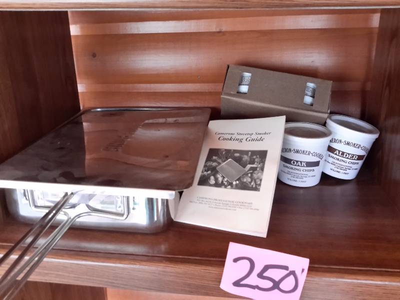 lot 250 image: Stove Top Smoker and lots of chips  Crock Pot, Cutting board,