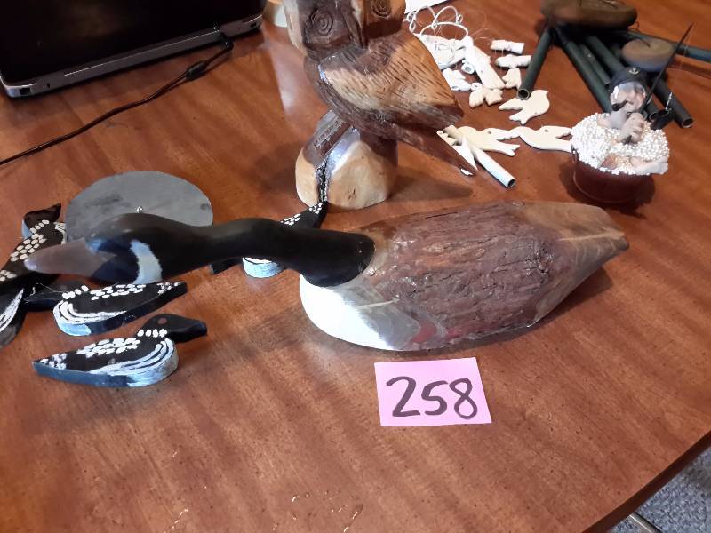 lot 258 image: Misc. Decorative items.. Includes Carved Canada Goose, and Carved owl.. Other items as shown.