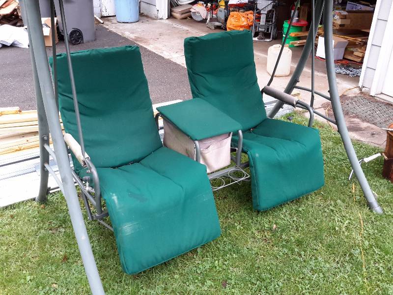 lot 251B image: Very nice two person swing.. Canvas cover and Seats (seats recently recovered).  Nice storage compartment between seats.