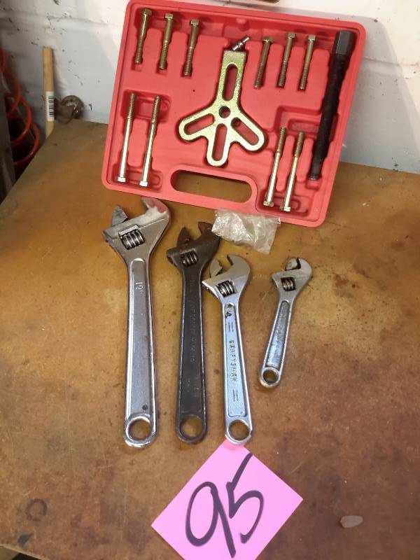 lot 95 image: 4 Crescent Wrenches and Steering wheel removal tools