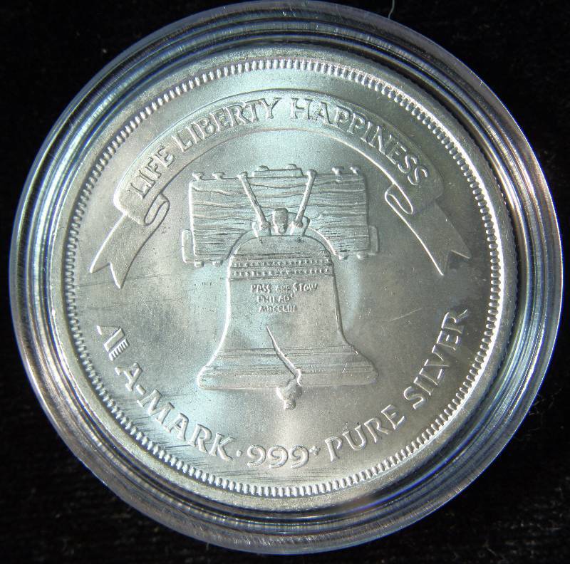 1 TROY OZ. .999 FINE SILVER A-MARK LIBERTY ROUND IN AIRTITE HOLDER