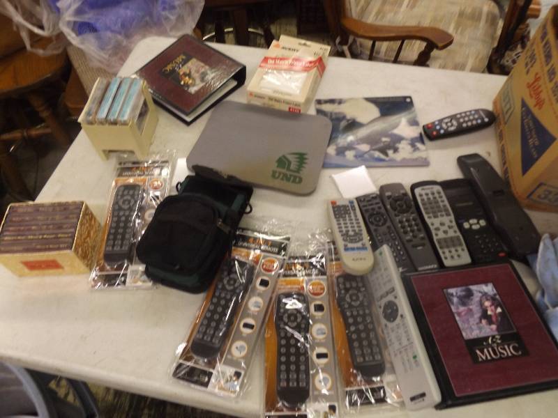 lot 632 image: Remote Controls, A-Z of Music Folder and more
