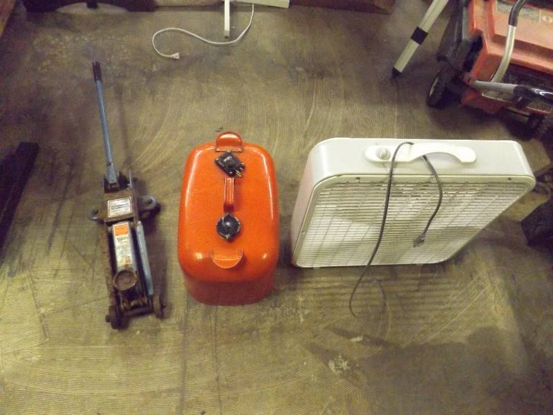 lot 681 image: Box fan, floor jack and marine gas can
