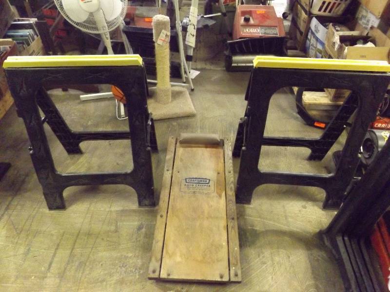 lot 686 image: Pair of sawhorses and Craftsman auto creeper