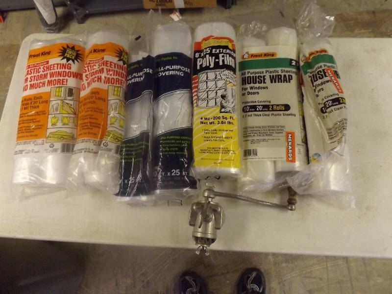 lot 724 image: Rolls of Plastic and old metal meat grinder