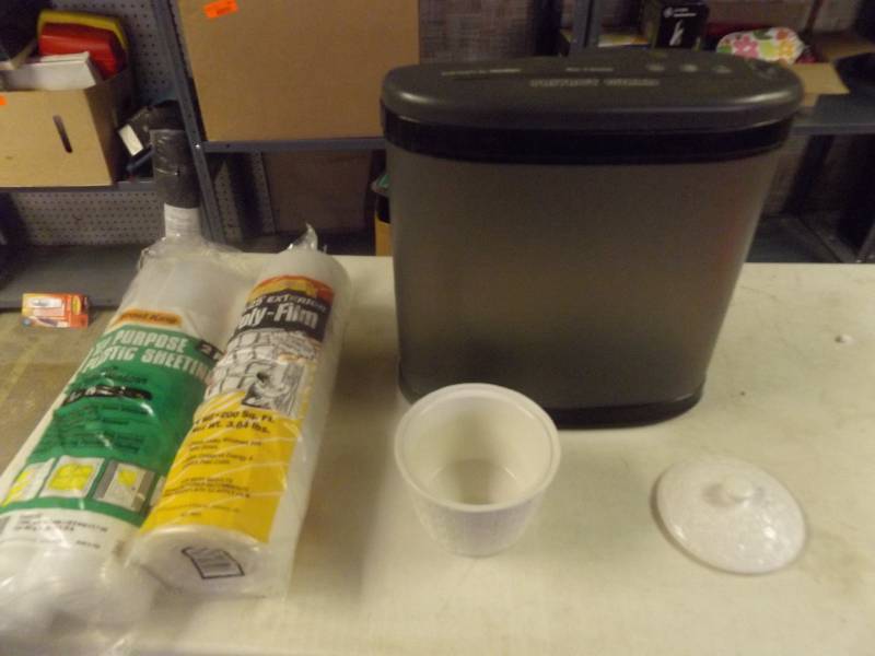 lot 728 image: Shredder, 2 rolls of plastic and decorative pot wlid
