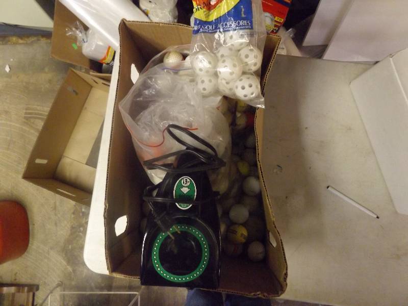 lot 742 image: golf balls and tees