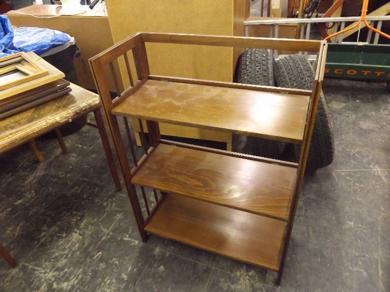 lot 762 image: folding wooden book shelf and older folding table